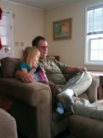 12/23/10 - Grandpa reading to Kaitlyn