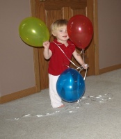 Happy with her balloons