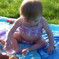 Kaitlyn splashing in the water