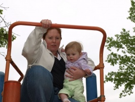 Kaitlyn and Mom getting ready to go down the slide