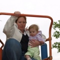Kaitlyn and Mom getting ready to go down the slide