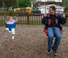 Dad and Kaitlyn swinging