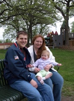 Mom, Dad, and Kaitlyn at the Playground