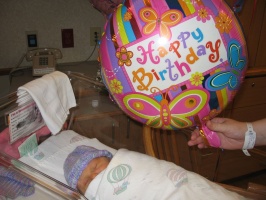 Kaitlyn with her birthday balloon