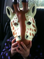 There is a giraffe in my backseat
