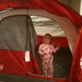 Kaitlyn up late in a tent