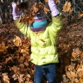 Kaitlyn playing in the leaves