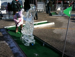 Kaitlyn playing mini-golf through Ice Sculptures
