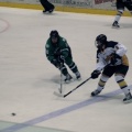 Trying to steal the puck