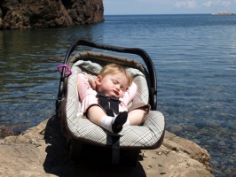 Kaitlyn relaxing by Lake Superior