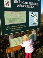 Kaitlyn reading the sign