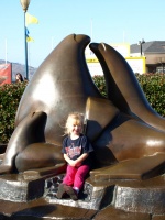 Kaitlyn with a sea lion sculpture