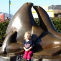 Kaitlyn with a sea lion sculpture