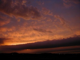 This is a picture of a early morning sunrise after a night of storms.
