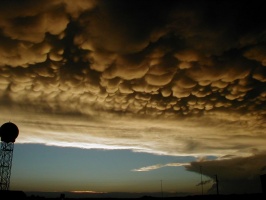 Burnt Mammatus from first storm, with second storm developing to the NW
