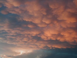 Pink mammatus and storm to the north