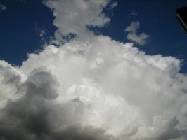 Looking up a towering cumulus
