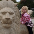 Kaitlyn riding a lion
